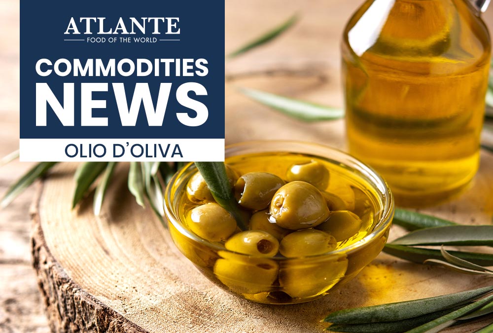 Bottles of Italian and Spanish extra virgin olive oil, key players in the global market amidst climate challenges and production growth.